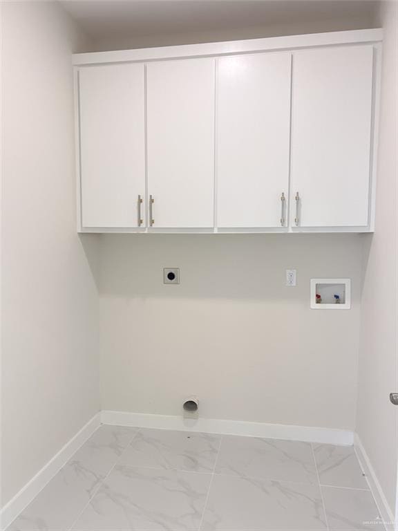 2309 S Cartier Dr, Edinburg, TX 78542 - washroom featuring hookup for an electric dryer, light marble finish flooring, baseboards, and washer hookup