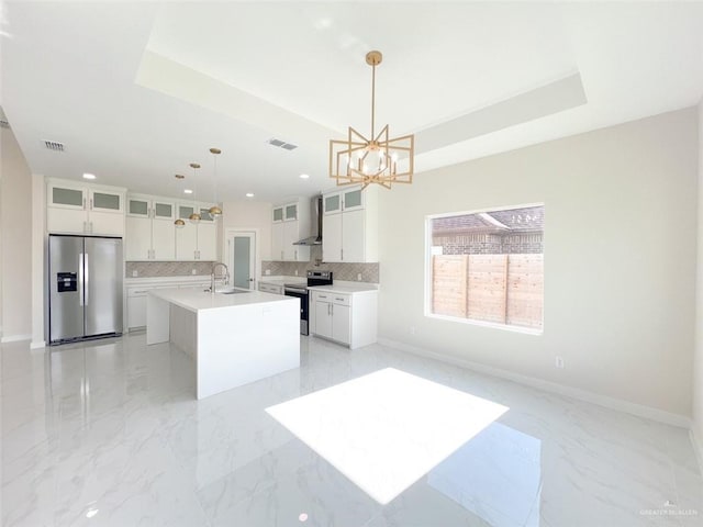 2309 S Cartier Dr, Edinburg, TX 78542 - kitchen featuring stainless steel appliances, a sink, backsplash, white cabinets, and recessed lighting