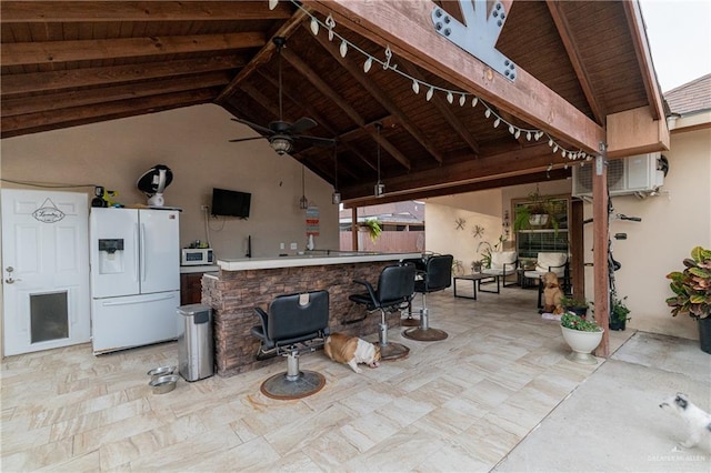 view of patio with a gazebo and ceiling fan