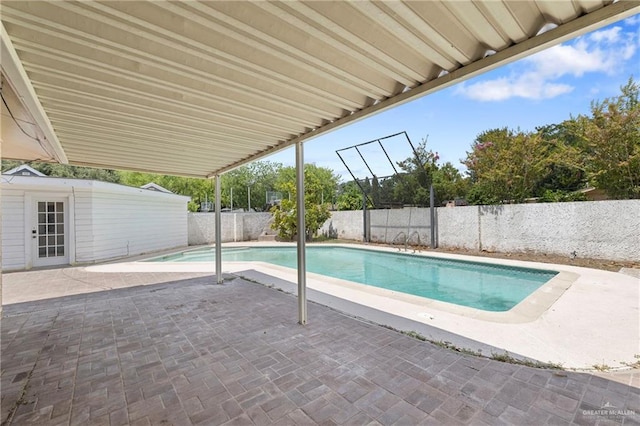 207 E Jackson Ave, Mcallen, TX 78501 - view of swimming pool featuring a patio and a fenced backyard