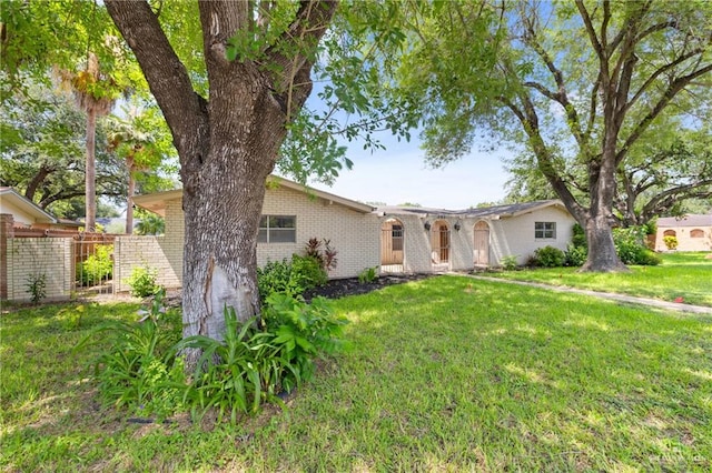 207 E Jackson Ave, Mcallen, TX 78501 - view of front facade featuring brick siding
