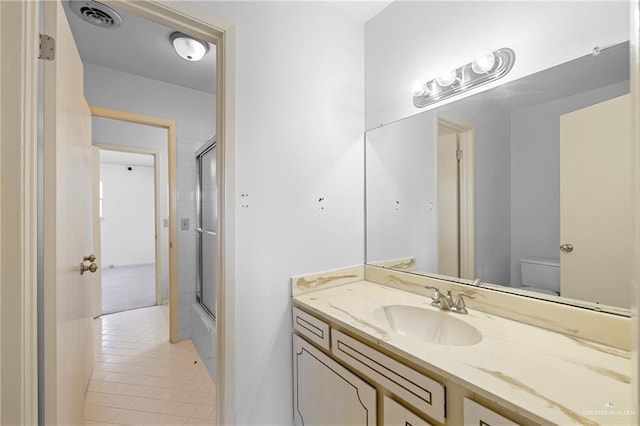 207 E Jackson Ave, Mcallen, TX 78501 - bathroom featuring vanity and tile patterned flooring
