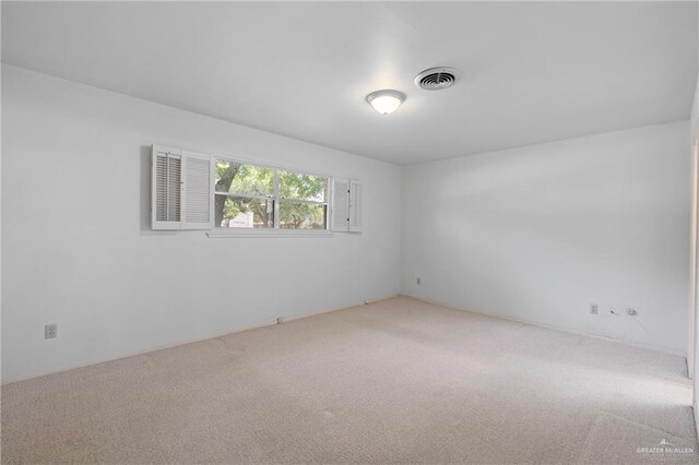 207 E Jackson Ave, Mcallen, TX 78501 - view of carpeted spare room