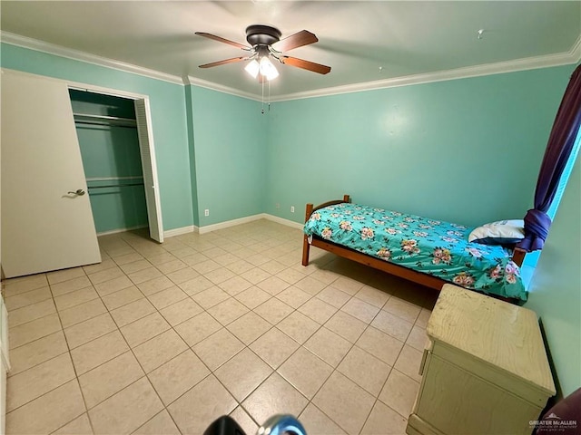 6501 Magnum Rd, Mission, TX 78573 - bedroom with ornamental molding, light tile patterned floors, a ceiling fan, and a closet