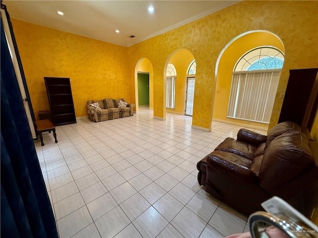 6501 Magnum Rd, Mission, TX 78573 - tiled living area with arched walkways, recessed lighting, and ornamental molding