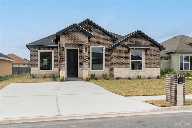 view of front of property with a front lawn