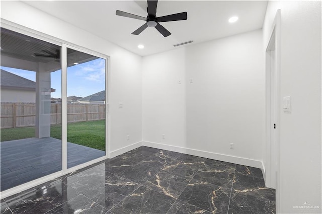 unfurnished room featuring ceiling fan