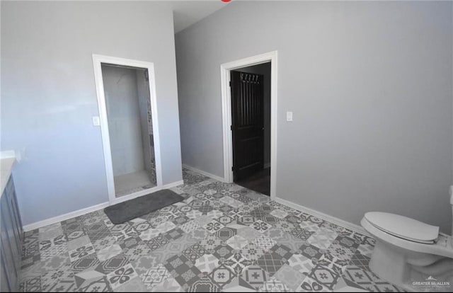 tiled bedroom with a closet