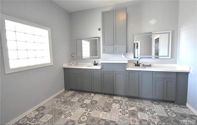 bathroom featuring tile patterned floors and vanity