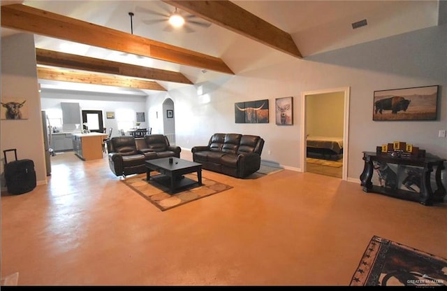 living room with beam ceiling and ceiling fan