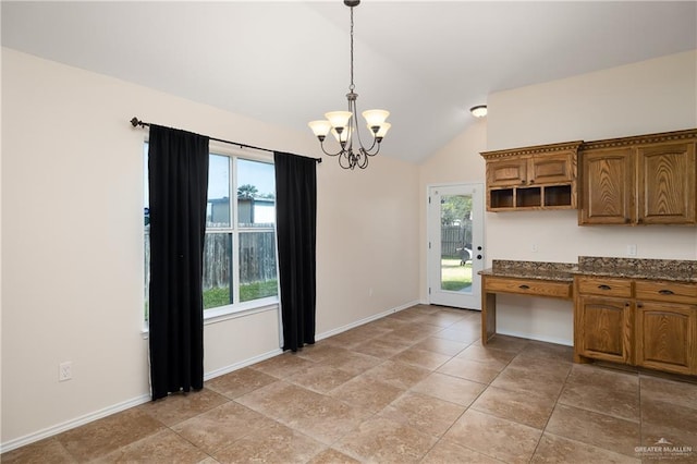 2002 Butkus Dr, Edinburg, TX 78542 - kitchen featuring open shelves, a chandelier, lofted ceiling, baseboards, and decorative light fixtures