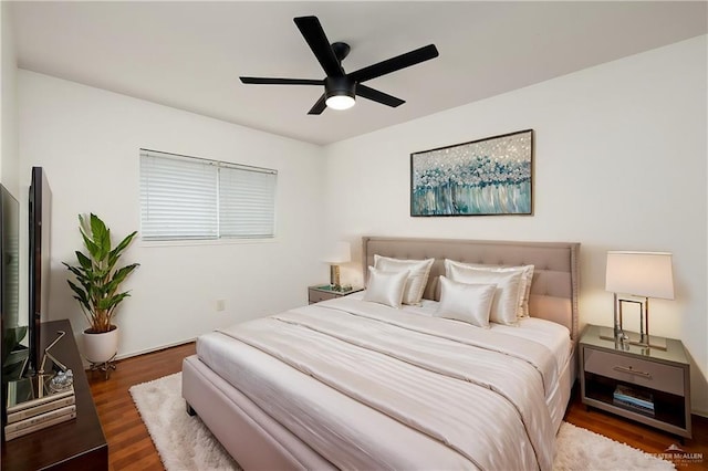 bedroom featuring wood-type flooring and ceiling fan