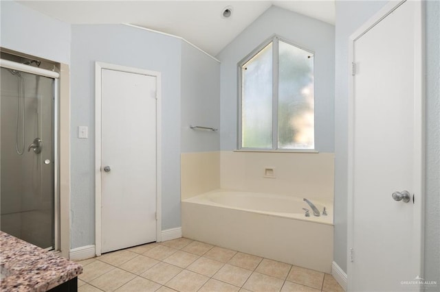 bathroom with tile patterned flooring, vanity, lofted ceiling, and shower with separate bathtub