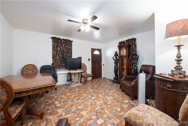 interior space featuring ceiling fan