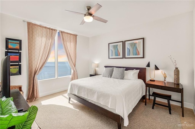 310A Padre Blvd Unit 2304, South Padre Island, TX 78597 - bedroom featuring baseboards and ceiling fan