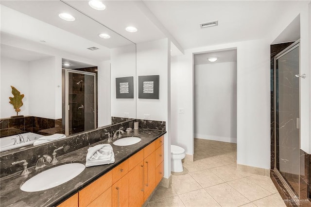 310A Padre Blvd Unit 2304, South Padre Island, TX 78597 - full bathroom with a stall shower, double vanity, a bath, tile patterned flooring, and recessed lighting