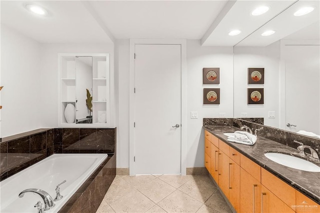 310A Padre Blvd Unit 2304, South Padre Island, TX 78597 - bathroom featuring double vanity, a bath, and recessed lighting