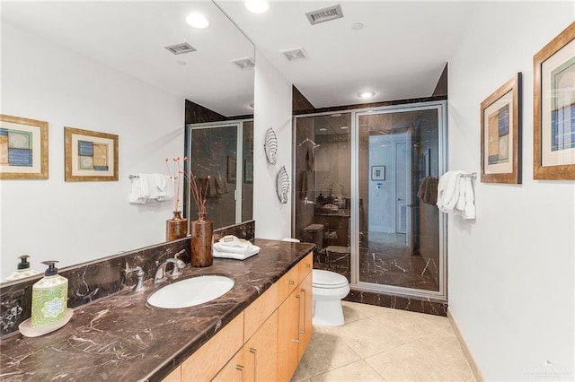 310A Padre Blvd Unit 2304, South Padre Island, TX 78597 - bathroom with vanity, a shower stall, tile patterned flooring, and recessed lighting
