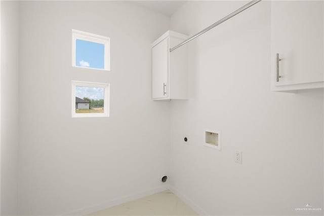 2810 E Uva Ave, Hidalgo, TX 78557 - washroom featuring cabinet space, electric dryer hookup, hookup for a washing machine, and baseboards