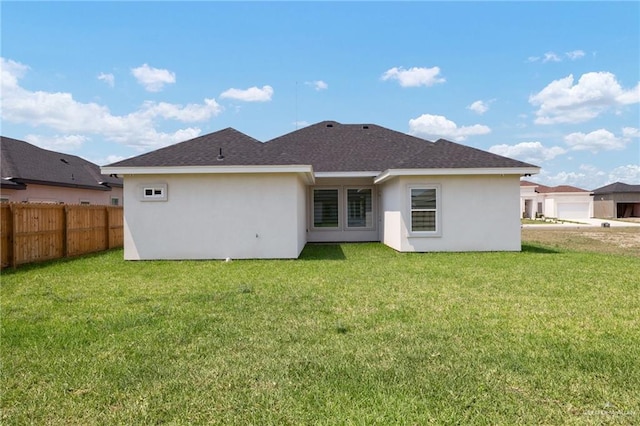 2810 E Uva Ave, Hidalgo, TX 78557 - rear view of property featuring stucco siding and roof with shingles