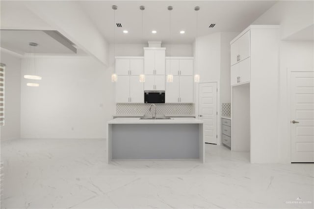 2810 E Uva Ave, Hidalgo, TX 78557 - kitchen with a sink, recessed lighting, decorative backsplash, white cabinetry, and light countertops
