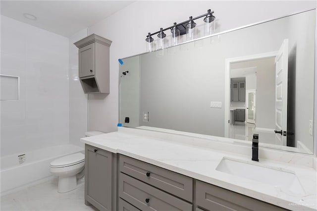 full bathroom with vanity, bathtub / shower combination, and toilet