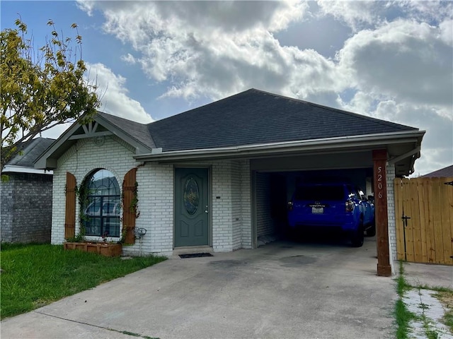 ranch-style house with a carport