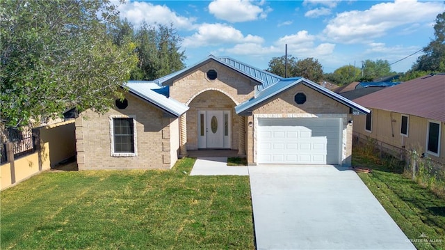 view of front facade with a front lawn and a garage