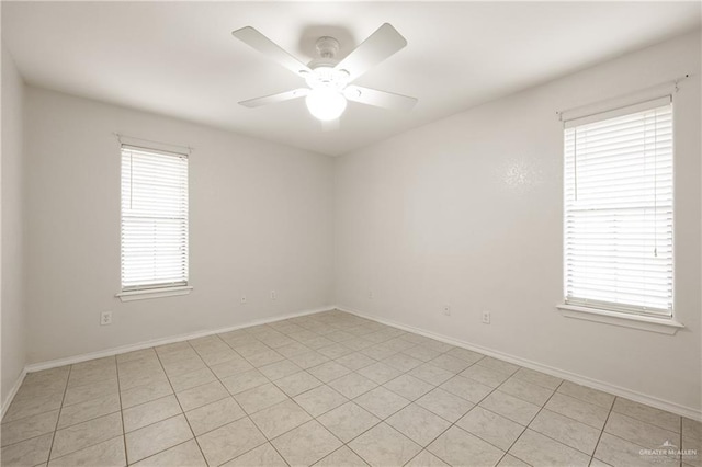 unfurnished room featuring ceiling fan