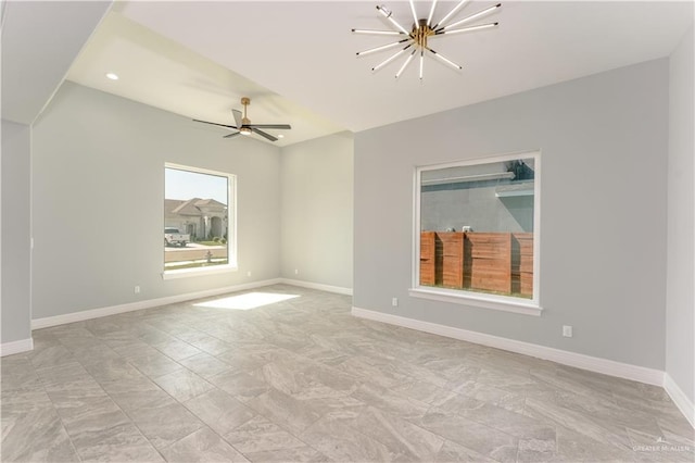 1711 Lago Delton, Edinburg, TX 78542 - unfurnished room with a chandelier, baseboards, and a ceiling fan