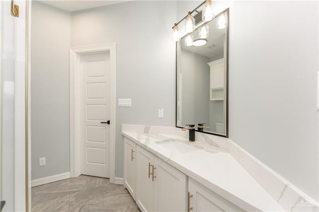 1711 Lago Delton, Edinburg, TX 78542 - bathroom featuring marble look tiles and vanity
