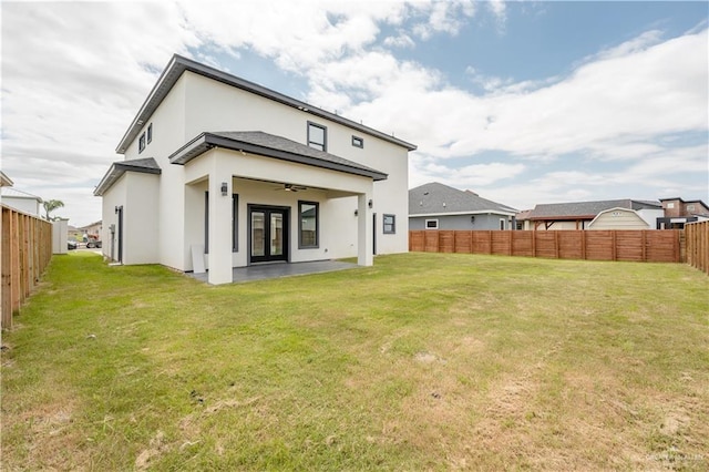 1711 Lago Delton, Edinburg, TX 78542 - rear view of house featuring french doors, ceiling fan, stucco siding, and a patio area