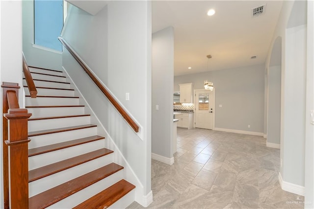 1711 Lago Delton, Edinburg, TX 78542 - staircase with recessed lighting, baseboards, and arched walkways