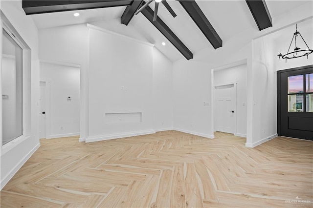 entrance foyer with beamed ceiling, high vaulted ceiling, and a notable chandelier