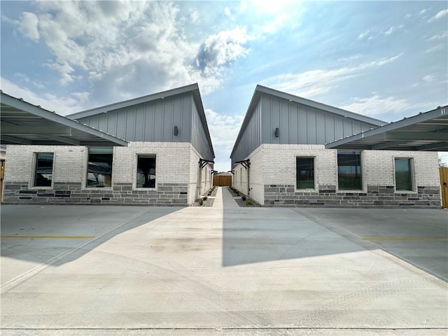 view of home's exterior featuring a carport