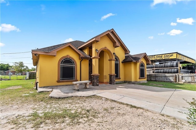 view of front of home with a patio