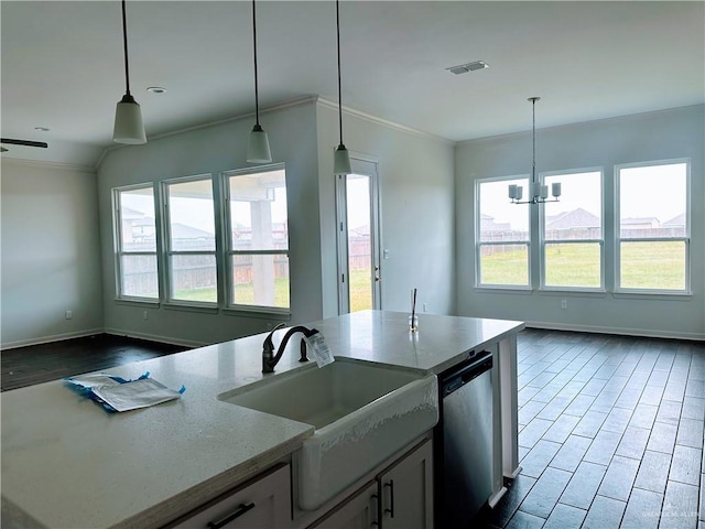 14620 Aqualina Way, Mcallen, TX 78504 - kitchen with visible vents, a kitchen bar, dark wood-type flooring, arched walkways, and stainless steel appliances