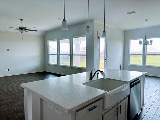 14620 Aqualina Way, Mcallen, TX 78504 - kitchen featuring light countertops, under cabinet range hood, white cabinets, tasteful backsplash, and stainless steel appliances