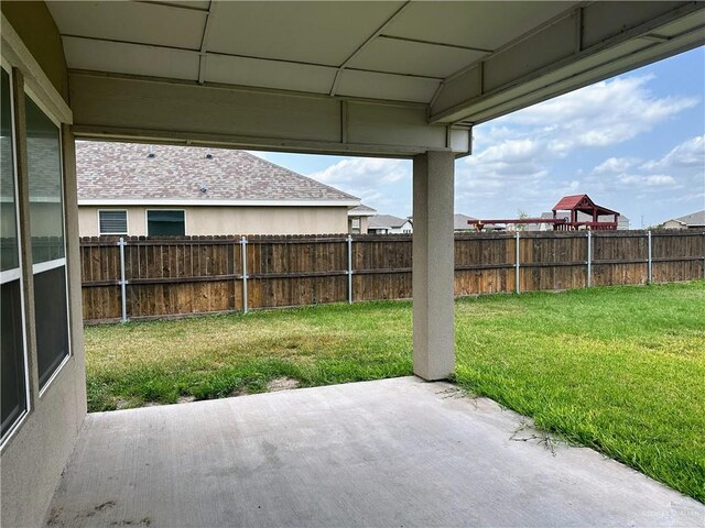 14620 Aqualina Way, Mcallen, TX 78504 - bathroom with baseboards, a shower stall, a garden tub, and wood finished floors