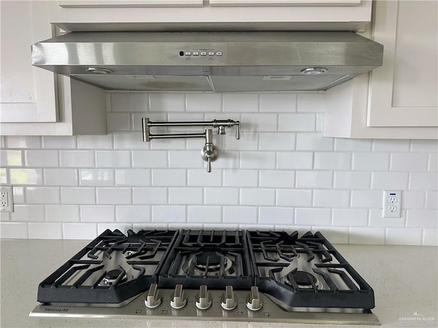 14620 Aqualina Way, Mcallen, TX 78504 - kitchen with under cabinet range hood, appliances with stainless steel finishes, visible vents, and light countertops