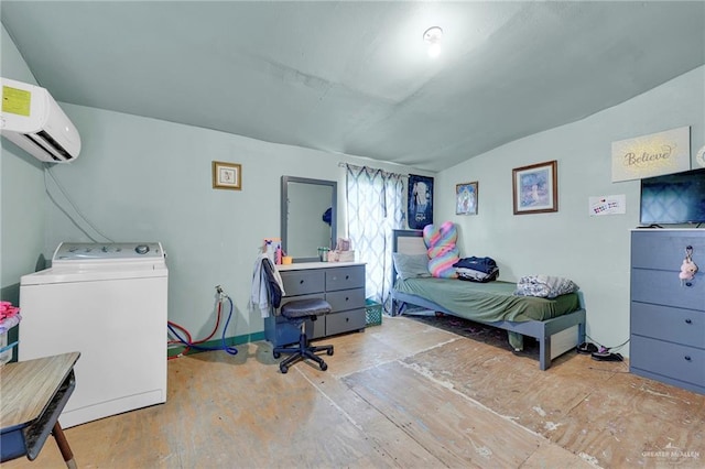 2304 Jose De La Cruz Rd, Mission, TX 78574 - bedroom with washer / clothes dryer, vaulted ceiling, and an AC wall unit
