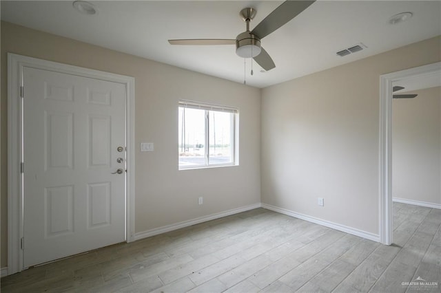 entryway featuring ceiling fan and light hardwood / wood-style floors