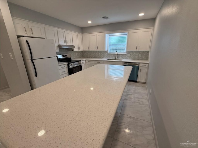 kitchen featuring marble finish floor, stainless steel appliances, decorative backsplash, white cabinetry, and under cabinet range hood