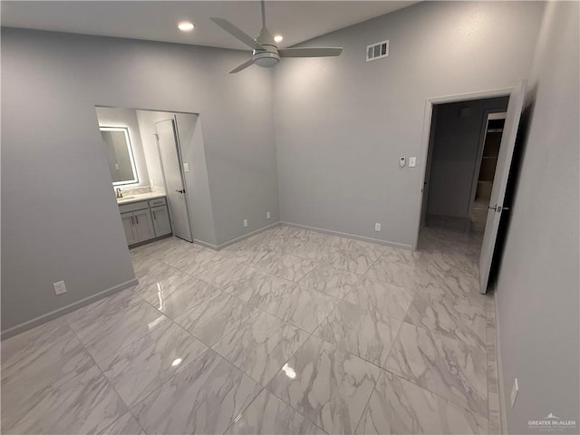 unfurnished bedroom featuring marble finish floor, recessed lighting, visible vents, and baseboards