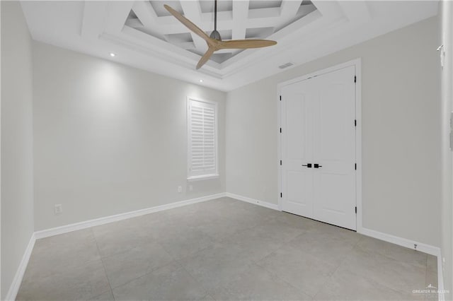 2502 Sandstone Dr, Mission, TX 78574 - spare room featuring ceiling fan, coffered ceiling, baseboards, a raised ceiling, and recessed lighting