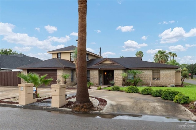 2820 Joan Dr, Edinburg, TX 78541 - view of front of property with curved driveway and brick siding