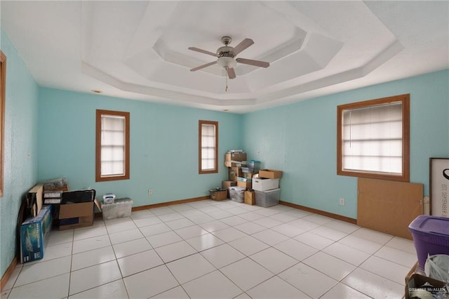 2820 Joan Dr, Edinburg, TX 78541 - empty room featuring a tray ceiling and ceiling fan