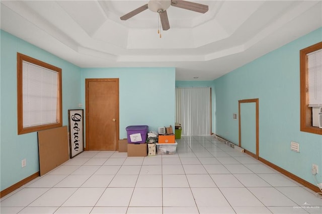 2820 Joan Dr, Edinburg, TX 78541 - spare room featuring a tray ceiling and ceiling fan