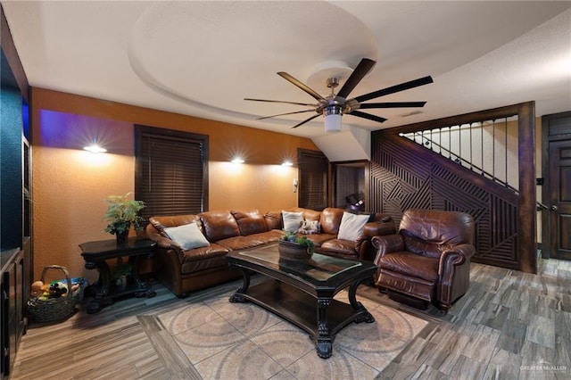 2820 Joan Dr, Edinburg, TX 78541 - living room with a ceiling fan, wood finished floors, and stairs