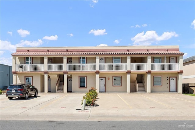 multi unit property featuring a balcony